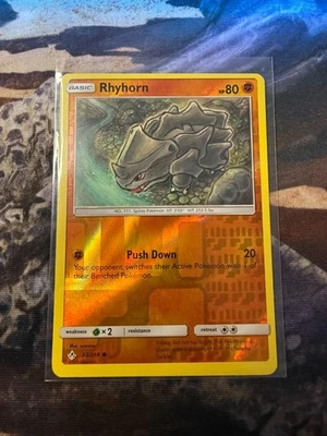Rhyhorn 92/214 Sm-Unbroken Bonds Reverse Holo - Image 1 of 2