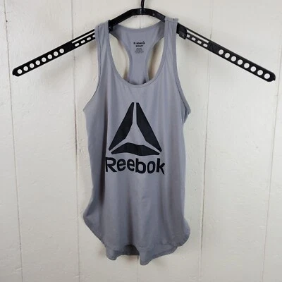 Camiseta sin mangas Reebok para mujer pequeña gris cuello redondo sin mangas espalda deportiva gráfica elástica Foto 1 de 4