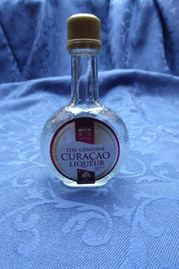 1 leere Schnapsflaschen the genuine Curacao Liquer 0,05l / 50ml Miniatur gut - Bild 1 von 3