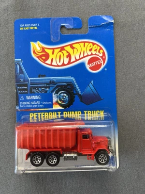 Hot Wheels, “Peterbilt Dump Truck” (#100)  New in Package - Image 1 of 4