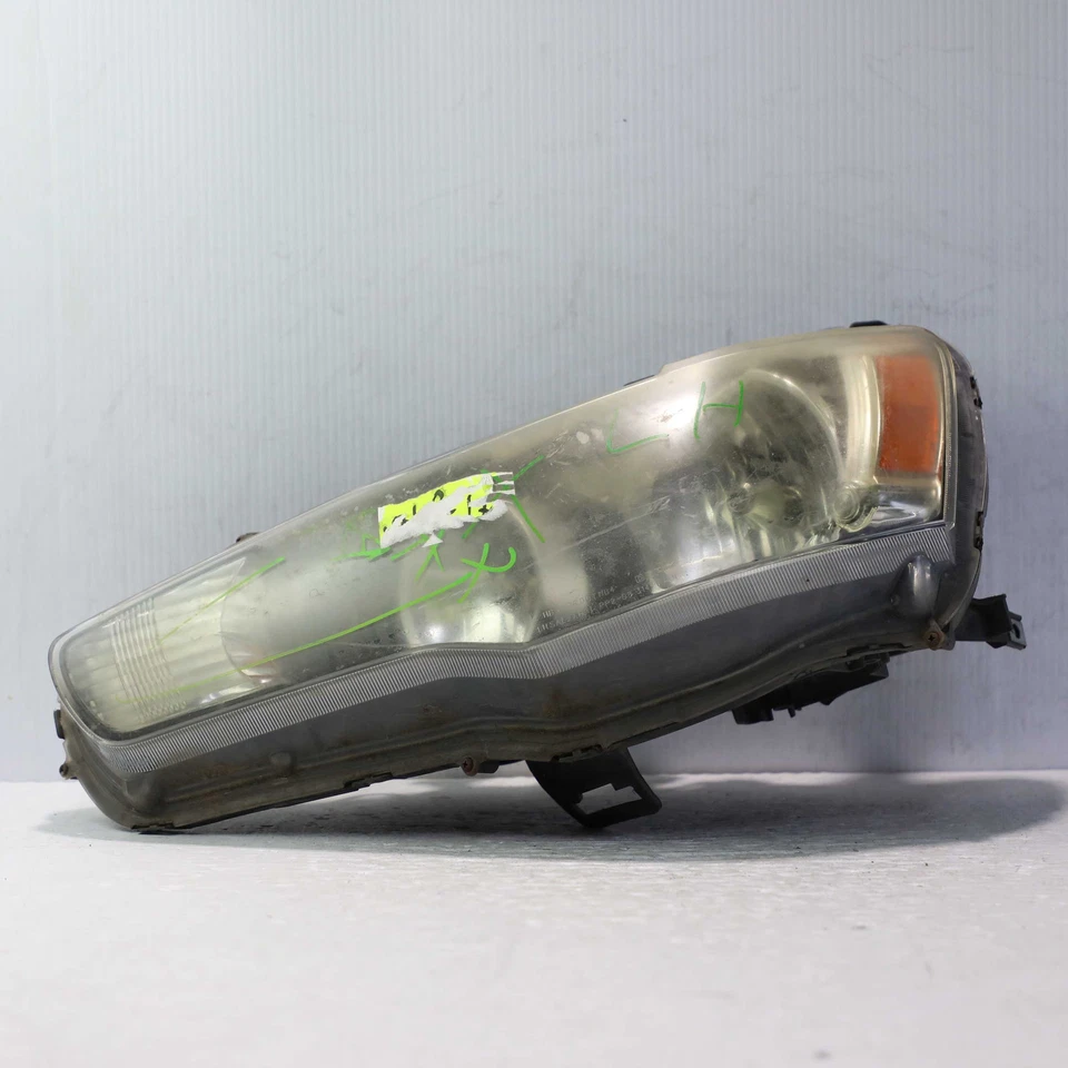 Conjunto de faros halógenos del lado del conductor izquierdo Mitsubishi Lancer 2009-2014 Foto 1 de 4