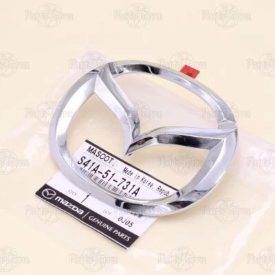 Fabricante de equipos originales Mazda PROTÉGÉ MILLENNIA 2001-03 cromo parrilla delantera logotipo emblema S41A-51-731A Foto 1 de 4