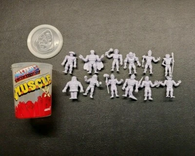 Super7 宇宙大师 M.U.S.C.L.E. 12 人偶套装 & Can Wave 1 NerdBlock — 第 1/4 张图片