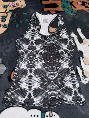 Camiseta sin mangas Asics para mujer talla XSmall negra blanca entrenamiento poliéster  Foto 1 de 4