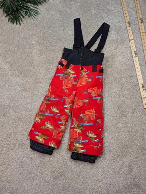 Pantalones con tirantes Obermeyer para nieve niños 3 alces rojos estampado de esquí crezco aislados Foto 1 de 4
