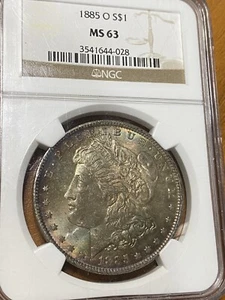 1885 O Morgan Silver Dollar NGC MS63 Colorful Toning - Picture 1 of 3