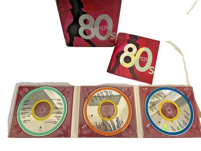Hits of the 80s Origional Hits Original Artists 3 CD's in Metal Tin Foto 1 de 4