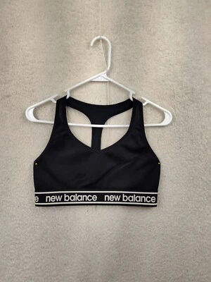 Sujetador deportivo New Balance para mujer mediano negro mezcla de polietileno espalda deportiva ritmo impacto Foto 1 de 4