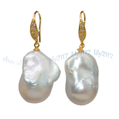 Pendientes de gancho de plata y oro con diamantes de imitación de perlas barrocas blancas naturales de 15-25 mm Foto 1 de 4