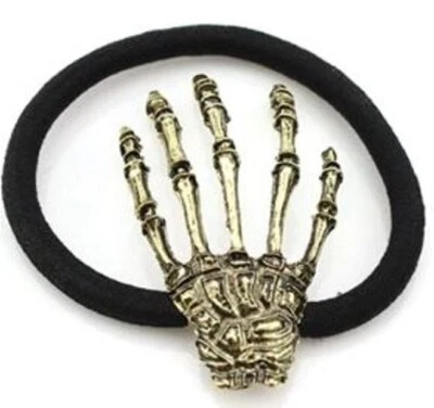 Haargummi Haarschmuck Skeletthand GOLD Knochen Haarband - Bild 1 von 2