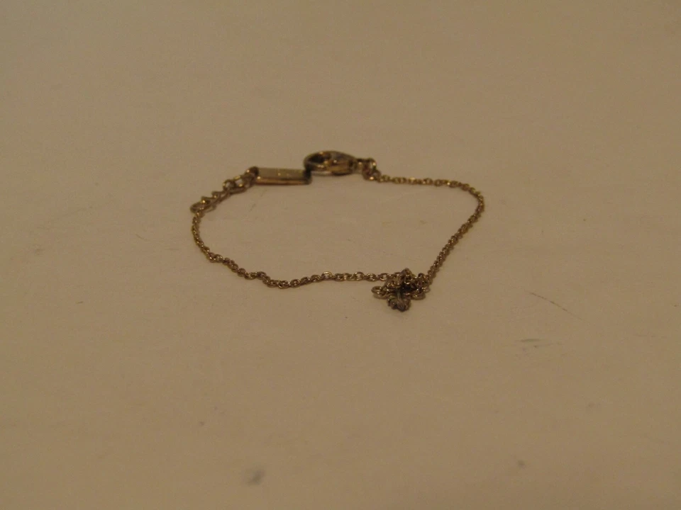 Coach Gold Mini Demi-Fine Feather Bracelet - Imagem 1 de 4