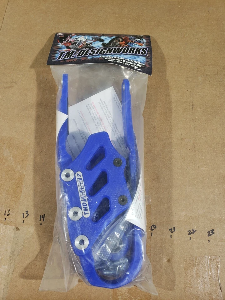 Kit de cadena deslizable y guía TM Designworks Baja Endurance azul Kawasaki 16-up KFX450 Foto 1 de 4