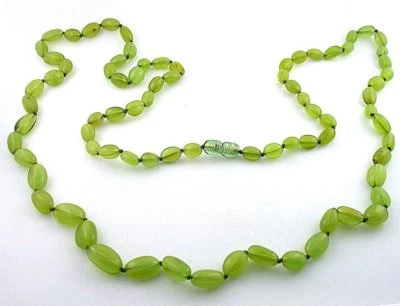 Natural Oval Green Baltic Amber Graduated 36 Inch Gemstone Necklace With Clasp - Image 1 of 3