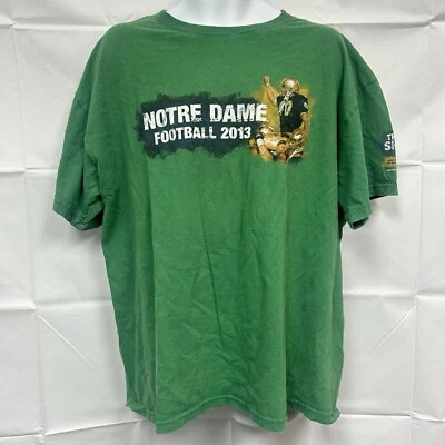 Notre Dame Football The Shirt 2013 XL On The Heels Of Legends Green Antigua - Image 1 of 4