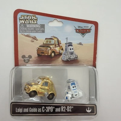 Disney Pixar Cars Луиджи и Гидо в роли C-3PO и R2-D2 Star Wars выходные 2013 - Изображение 1 из 4