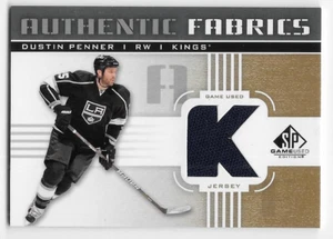 11/12 SP GAME USED AUTHENTIC FABRICS GOLD 'K' GAME JERSEY Dustin Penner #AFDU - Picture 1 of 1