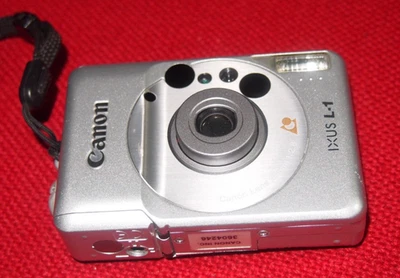 Vintage Silver -Canon IXUS L-1  -APS Compact Film Camera w/ Case - Tested - Image 1 of 4