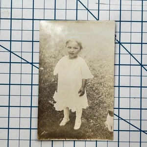 RPPC Vintage Real Photo Postcard of Child in White Dress with Dog - Picture 1 of 3