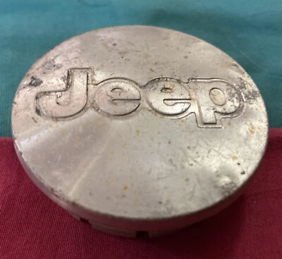 Tapa central Jeep Wrangler Grand Cherokee Compass Commander Liberty 52059522AA OEM Foto 1 de 4