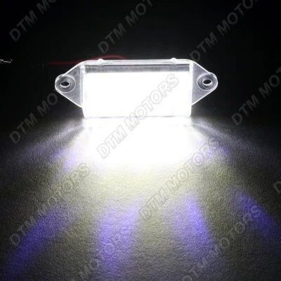 Белый светодиодный фонарь для номерного знака 18-SMD 6000K для Mitsubishi Lancer Evolution 2007-2017 годов выпуска - Изображение 1 из 4