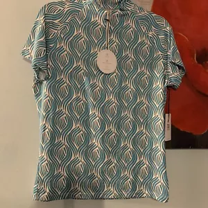 Neu mit Etikett Damen Golf Tennis blau Top Shirt Schwanz Stehkragen L neu UPF 50 RTL $ 62,50 - Bild 1 von 7