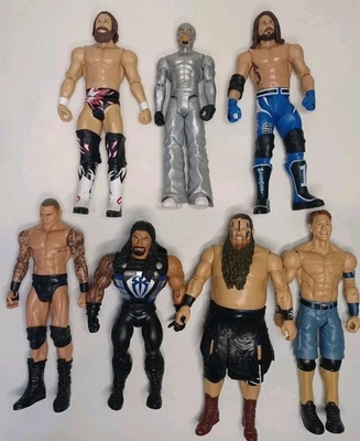 Lote de 7 figuras WWE Basic Series 121 Rey Mysterio & Cena y más Foto 1 de 4