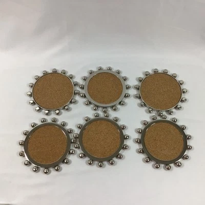 Posavasos corona Starburst con acentos para el hogar Global Views-níquel Foto 1 de 4