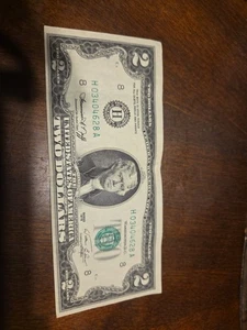 2 Dollar Bill 1976 MISPRINT ON SECURITY SEAL AND SERIAL NUMBER OF TREMENDOUSLY  - Picture 1 of 2