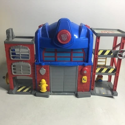 Transformers Rescue Bots Firehouse 2010 juego con camión de bomberos en buen estado Foto 1 de 4
