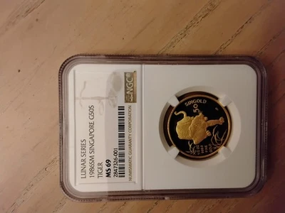 1/2 oz Singapore Tiger MS 69 gold coin - Image 1 of 2