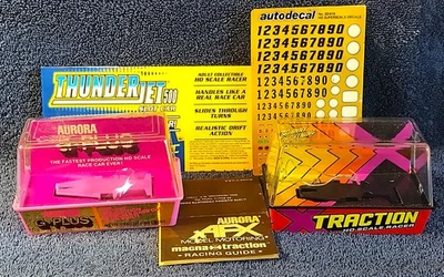 Lote de estuches de coche ranura Aurora AFX Johnny Lightning Auto World de colección Foto 1 de 4