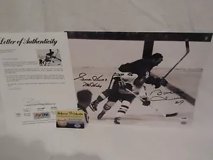 Gordie Howe (D 2016) & Bobby Hull foto autografata 11x14 - PSA LOA completo - Foto 1 di 12