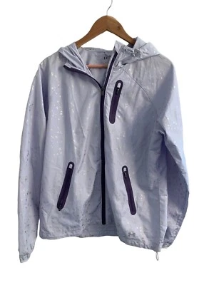 CHAQUETA DEPORTIVA CON CAPUCHA UNDER ARMOR MUJER TALLA GRANDE MORADA Y PLATEADA Foto 1 de 4