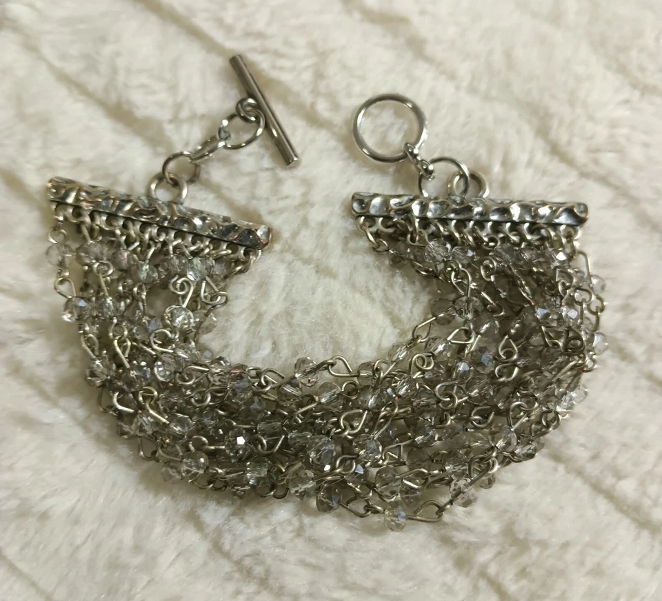 Pulsera de palanca de plata de cristal retorcido Foto 1 de 4
