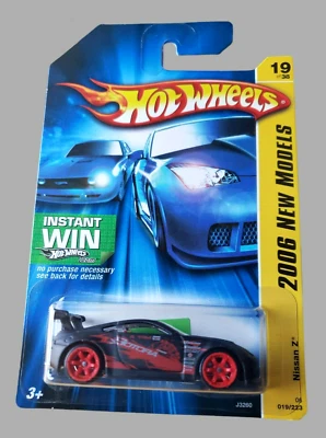 Hot Wheels NISSAN Z Flat Black 2006 New Models #19/38 1:64 #J3260 Red CM 6 Spoke - Image 1 of 4
