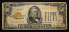 SERIES OF 1928 $50 GOLD CERTIFICATE TORN & TAPED