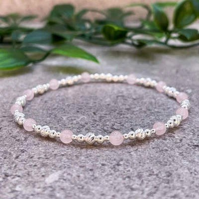 Pulsera elástica con cuentas de piedras preciosas rosas y cuarzo rosa plata de ley Foto 1 de 4