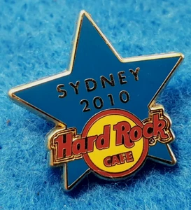 SYDNEY TIENDA MINORISTA APERTURA PERSONAL ESTRELLA DE ENTRENAMIENTO AZUL 2010 Hard Rock Café PIN LE50 - Imagen 1 de 2