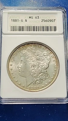 Jabonera 1881-S ANACS MS63 Morgan tono de borde dorado con brillo estelar ver el video Foto 1 de 4