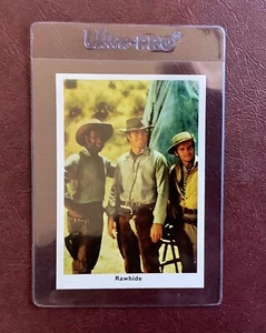 TARJETA ESTRELLA DE PELÍCULA CLINT EASTWOOD CUERO CRUDO AÑOS 60 - Imagen 1 de 2