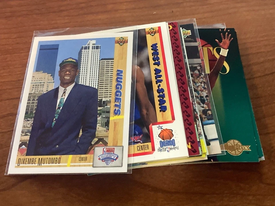 DIKEMBE MUTOMBO 1991-2022 Pick Any Upick Rookie Insert Star Cards NM/MT Discount - Image 1 of 1