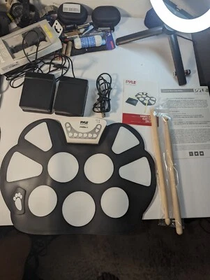 Kit de almohadilla de batería electrónica portátil de silicona plegable con palo negro para juguete para niños Foto 1 de 3