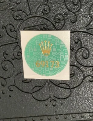 Authentic Rolex 69173 Ladies Oyster DateJust Green Case Back Hologram Sticker - Image 1 of 4