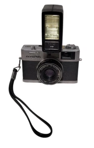 Olympus 35 mm fotocamera radiocomandata pellicola telemetro con obiettivo 42 mm f2,8 flash Vivitar testato T7 - Foto 1 di 9