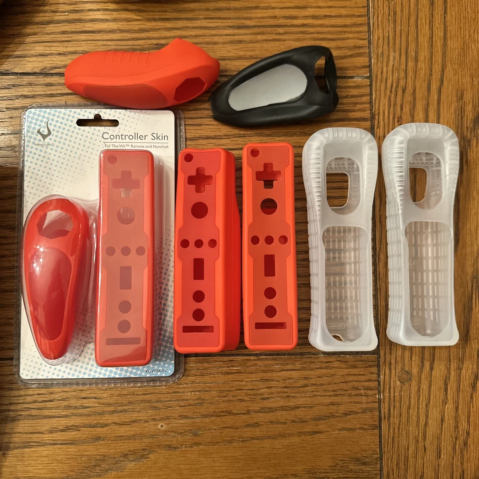 Mando a distancia Nintendo Wii y fundas de goma rojas Nunchuk nuevas Foto 1 de 4