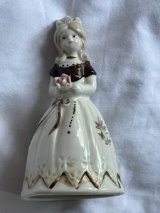 VINTAGE CERAMIC Victorian GIRL IN BROWN FLORAL DRESS HOLDING PINK FLOWER BELL - Picture 1 of 7