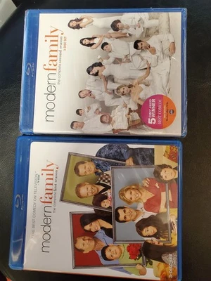Modern Family DVD First [USED] + Second Season[NEW SEALED BUT RIPPED] Blu Ray - Image 1 of 2