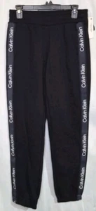 Pantalones deportivos pequeños de rendimiento para mujer Calvin Klein con logotipo negro - Imagen 1 de 4