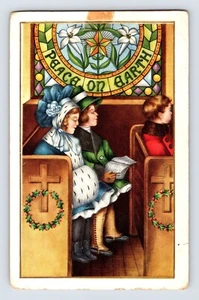 Postcard Christmas Children Church Pew 1910s Unposted Divided Back - Picture 1 of 2