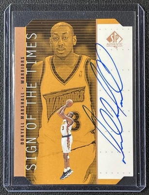 DONYELL MARSHALL 1998-99 SP AUTÉNTICO #DM SIGNO DE LOS TIEMPOS GUERREROS AUTOMÁTICOS DE BRONCE Foto 1 de 2